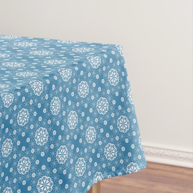 Abstract openwork floral pattern in light blue col tablecloth (In Situ)