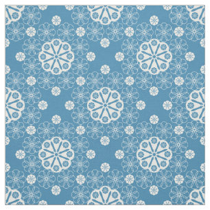 Abstract openwork floral pattern in light blue fabric