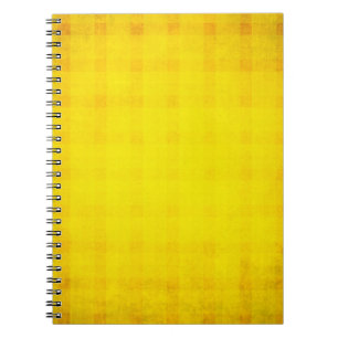 abstract orange background with vintage grunge bac notebook