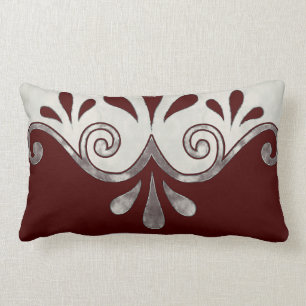 Abstract ornamental shape in burgundy and silver lumbar cushion