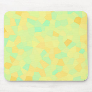 Abstract pattern of yellow and green shapes mouse pad