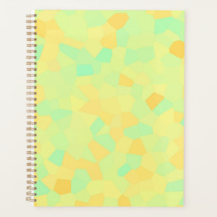 Abstract pattern of yellow and green shapes planner