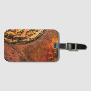 Abstract planet in red and orange luggage tag