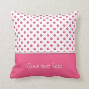 Abstract polka dots pink texture.Text. Cushion