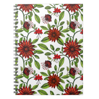 abstract red flowers and green leaves on white bac notebook