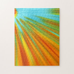Abstract red yellow orange green stripes on blue jigsaw puzzle
