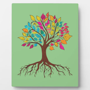 Abstract tree with roots and colourful leaves. plaque