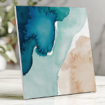 Abstract Watercolor Ocean Blue and Sand  Ceramic Tile<br><div class="desc">Bring an artistic touch to your space with this abstract watercolor tile featuring soft, blended shades of deep ocean blue, turquoise, and sandy beige. The fluid and organic design mimics natural watercolor brush strokes, creating gentle colour transitions and a free-flowing painted aesthetic. Perfect for backsplashes, accent walls, or adding a...</div>
