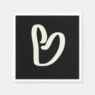 Abstract white heart on black napkin