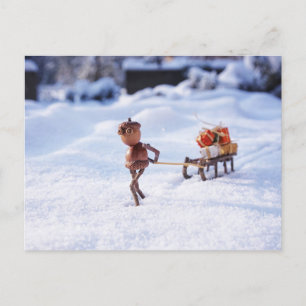 Acorn elf carrying Christmas presents on a sleigh Postcard
