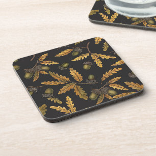 Acorns and oak leaves on black coaster