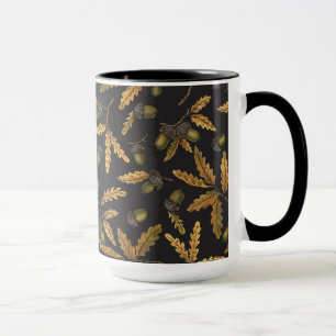 Acorns and oak leaves on black mug