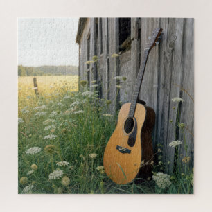 Acoustical Guitar Leaning on a Country Barn Jigsaw Puzzle