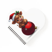 adorable baby highland cow sitting