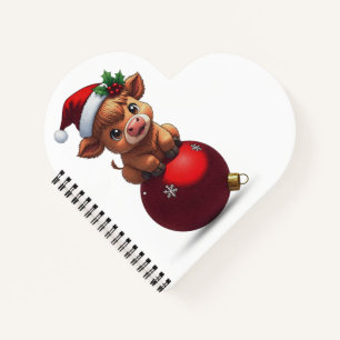 adorable baby highland cow sitting notebook