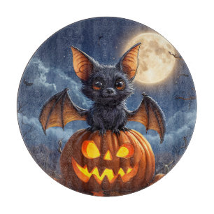 Adorable Cartoon Bat Perched on Jack-o'-Lantern Cutting Board