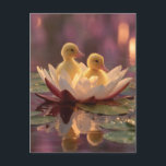 Adorable Ducklings in a Water Lily Flower Holiday Postcard<br><div class="desc">A magical and heartwarming image featuring two fluffy yellow ducklings nestled together inside a large, glowing water lily or lotus flower. The scene is set on a calm pond, with the ducklings and flower softly reflected in the water. The image is bathed in a warm, ethereal light with blurred bokeh...</div>