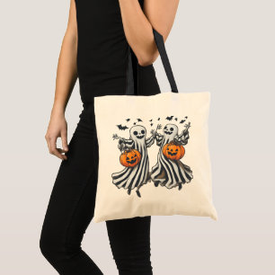 Adorable ghosts with pumpkins tote bag
