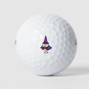 Adorable little bird wearing a wizard costume golf balls