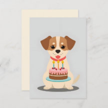 Adorable puppy with birthday cake
