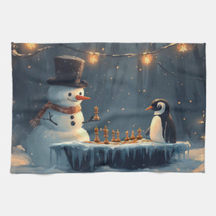 Adorable Snowman and Penguin Playing Chess Tea Towel