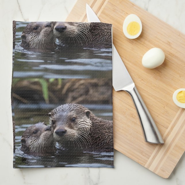 **"Adrift in Love: Mummy and Baby Otter"** Tea Towel (Quarter Fold)