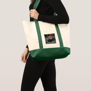 **"Adrift in Love: Mummy and Baby Otter"** Tote Bag
