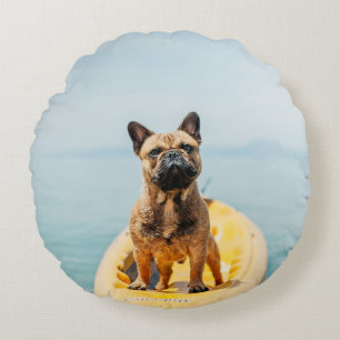 Adult brown French bulldog standing on kayak Round Cushion