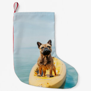 Adult brown French bulldog standing on kayak Small Christmas Stocking