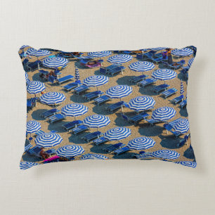 Aerial photography of blue-and-white patio umbrell decorative cushion