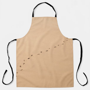 Aerial photography of footprints in the sand apron