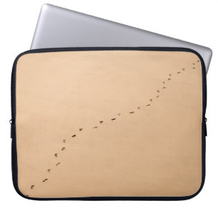 Aerial photography of footprints in the sand laptop sleeve