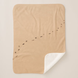Aerial photography of footprints in the sand sherpa blanket