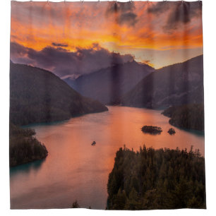 AERIAL PHOTOGRAPHY OF LAKE VIEWING MOUNTAIN UNDER  SHOWER CURTAIN