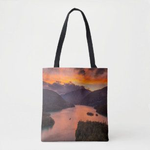 AERIAL PHOTOGRAPHY OF LAKE VIEWING MOUNTAIN UNDER TOTE BAG
