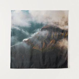 AERIAL PHOTOGRAPHY OF MOUNTAIN COVERED WITH FOG TAPESTRY