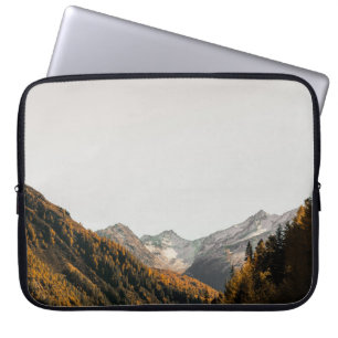 AERIAL PHOTOGRAPHY OF MOUNTAIN UNDER CLOUDY SKY LAPTOP SLEEVE