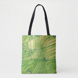 Aerial photography of rice field tote bag