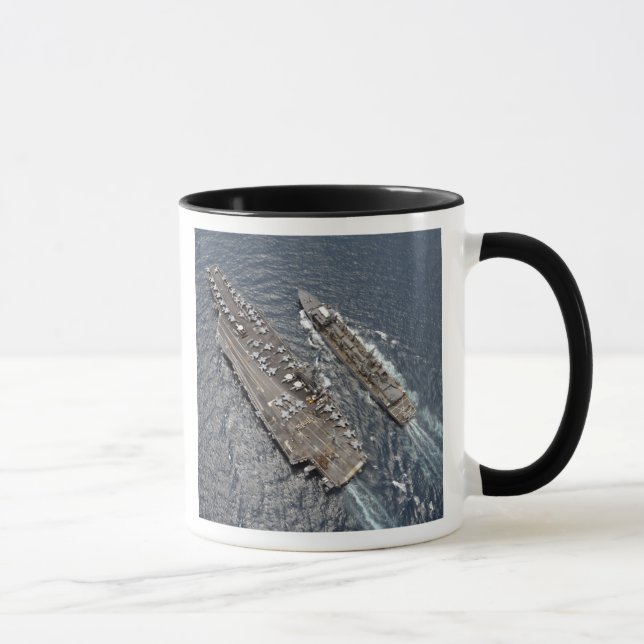 Aerial view of aircraft carrier USS Ronald Reag Mug (Right)
