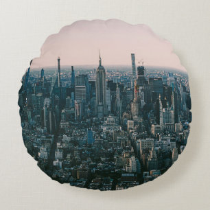 AERIAL VIEW OF CITY BUILDINGS DURING DAYTIME ROUND CUSHION