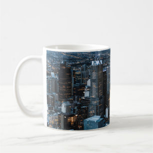 AERIAL VIEW OF CITY BUILDINGS DURING NIGHT TIME COFFEE MUG