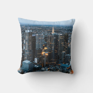 AERIAL VIEW OF CITY BUILDINGS DURING NIGHT TIME CUSHION