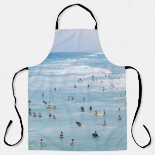 AERIAL VIEW OF GROUP OF PEOPLE SWIMMING ON BEACH APRON