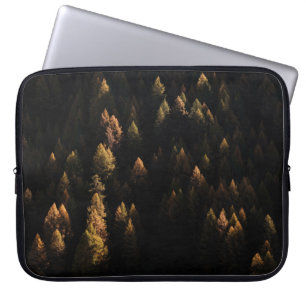 Aerial view of pine trees laptop sleeve