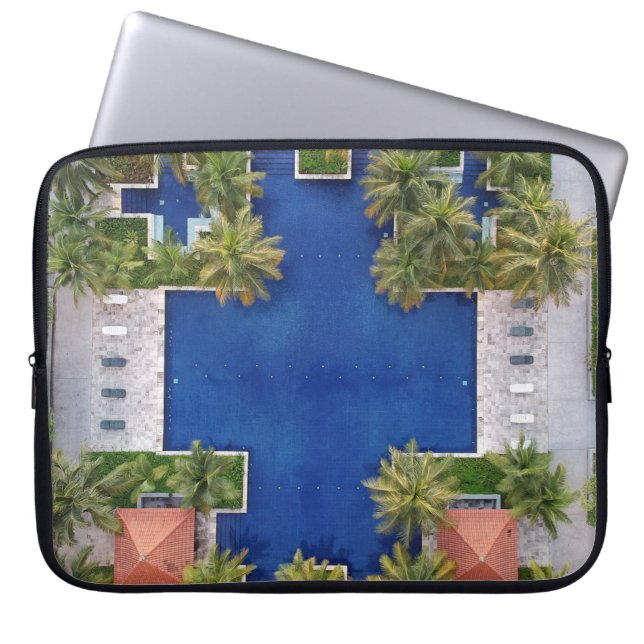 Aerial view of pool surrounded by palm trees laptop sleeve (Front)