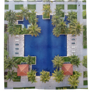 Aerial view of pool surrounded by palm trees shower curtain