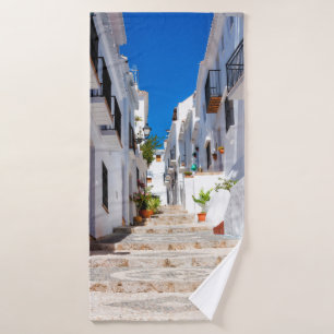 Aerial view of white city Frigiliana in sunny day Bath Towel