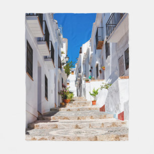 Aerial view of white city Frigiliana in sunny day Fleece Blanket