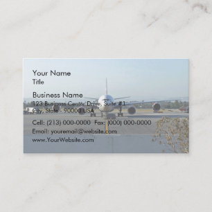 Aeroplane at airport with blue sky in background business card