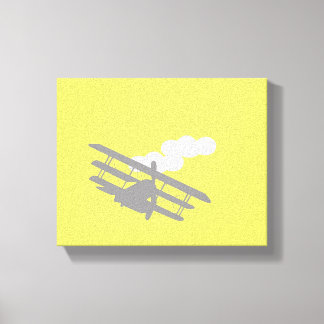 Aeroplane on plain yellow background. canvas print